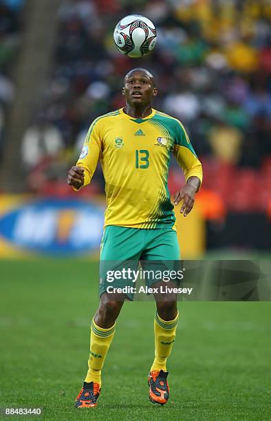 Kagisho Dikgacoi of South Africa controls the ball during the opening match of the FIFA Confederations Cup between South Africa and Iraq at Ellis...