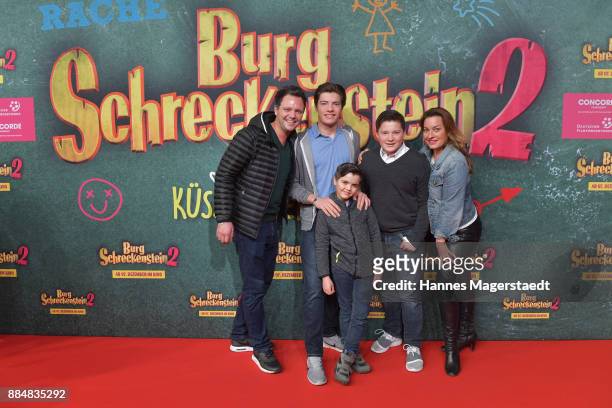 Julia Dahmen, Carlo Fiorito and their children Joshua, Emilio and Mikosch during the 'Burg Schreckenstein 2' Premiere at Mathaeser Filmpalast on...