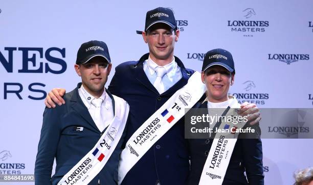 Winner Daniel Deusser of Germany riding 'Cornet d'Amour', second Simon Delestre of France riding 'Hermes Ryan' , third Lauren Hough of USA riding...