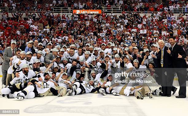 The Pittsburgh Penguins celebrate with the Stanley Cup after defeating the Detroit Red Wings by a score of 2-1 to win Game Seven and the 2009 NHL...