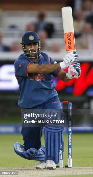 Mahendra Dhoni, captain of India plays a shot during the Super Eight stage of the ICC World Twenty20 Cup at Lord's cricket ground in London, on June...