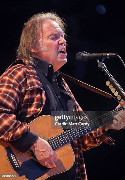 Neil Young performs on the main stage at the Isle of Wight Festival on June 14, 2009 in Newport, Isle of Wight. The festival, attended by 50,000...