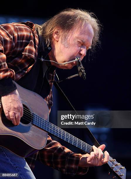 Neil Young performs on the main stage at the Isle of Wight Festival on June 14, 2009 in Newport, Isle of Wight. The festival, attended by 50,000...