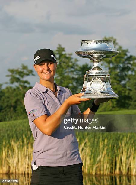 Anna Nordqvist of Sweden holds the championship trophy after winning the McDonald's LPGA Championship at Bulle Rock Golf Course on June 14, 2009 in...