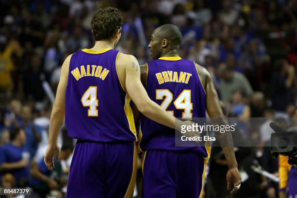 Luke Walton and Kobe Bryant of the Los Angeles Lakers walk up court together in the first half against the Orlando Magic in Game Five of the 2009 NBA...