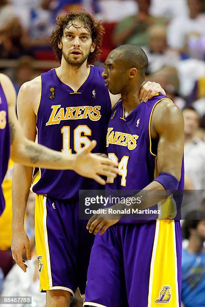 Pau Gasol puts his arm around Kobe Bryant of the Los Angeles Lakers in the second quarter against the Orlando Magic in Game Five of the 2009 NBA...