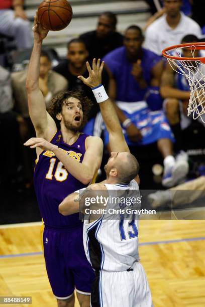 Pau Gasol of the Los Angeles Lakers shoots over Marcin Gortat of the Orlando Magic in the second half of Game Five of the 2009 NBA Finals on June 14,...
