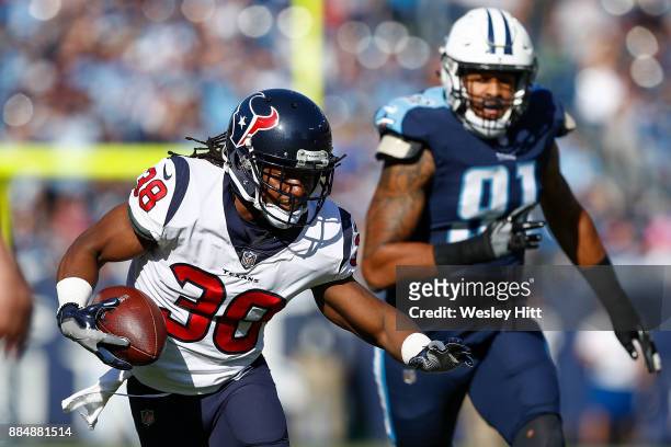 Andre Ellington of the Houston Texans runs with the ball after a reception against the Tennessee Titans during the first half at Nissan Stadium on...