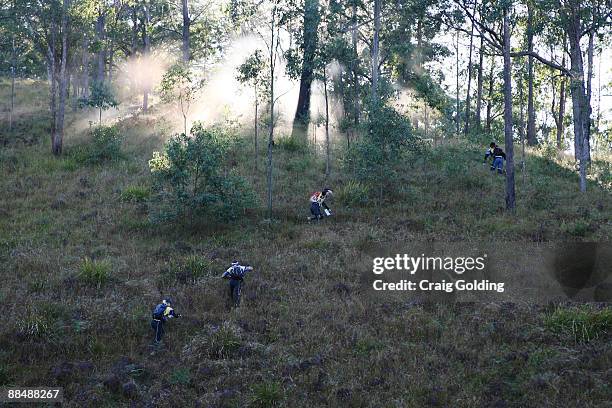 Competitors trek through the upper regions of the Bowman River on day one of the the GeoQuest 48 hour Adventure race held around the Barrington Tops...