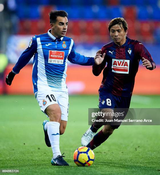 Takashi Inui of SD Eibar duels for the ball with Jose Manuel Jurado Marin of RCD Espanyol during the La Liga match between SD Eibar and RCD Espanyol...