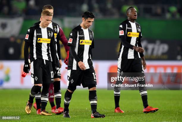 Lars Stindl of Moenchengladbach and his team mates walk off dejected after the Bundesliga match between VfL Wolfsburg and Borussia Moenchengladbach...