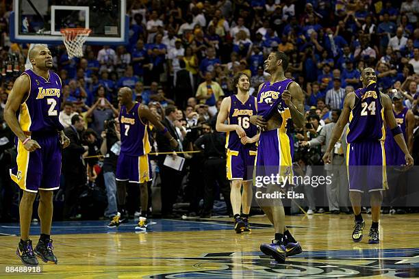 Derek Fisher, Lamar Odom, Pau Gasol, Trevor Ariza and Kobe Bryant of the Los Angeles Lakers begin celebrating after defeating the Orlando Magic 99-86...