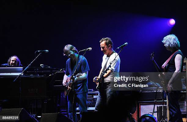 Vocalist/ Guitarist Bruce Springsteen performs with Keyboardist Page McConnell, Lead Vocalist/Guitarist Trey Anastasio and Bassist Mike Gordon of...