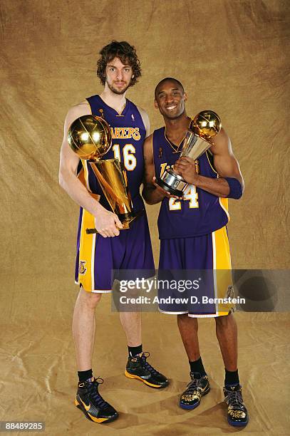 Pau Gasol and Kobe Bryant of the Los Angeles Lakers pose for a portrait after defeating the Orlando Magic in Game Five of the 2009 NBA Finals at...