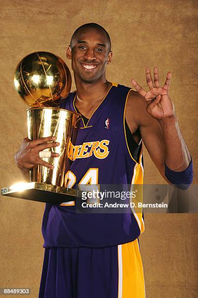 Kobe Bryant of the Los Angeles Lakers poses for a portrait after defeating the Orlando Magic in Game Five of the 2009 NBA Finals at Amway Arena on...