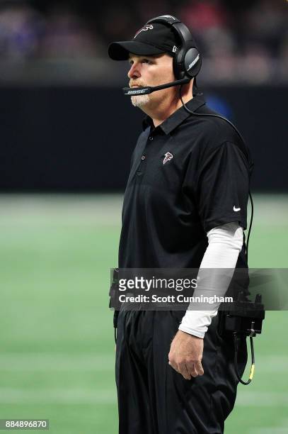 Head coach Dan Quinn of the Atlanta Falcons on the sidelines during the first half against the Minnesota Vikings at Mercedes-Benz Stadium on December...