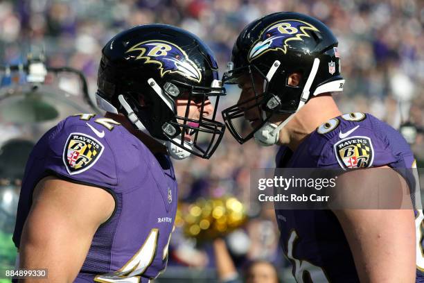 Fullback Patrick Ricard and tight end Nick Boyle of the Baltimore Ravens celebrate a touchdown in the second quarter against the Detroit Lions at M&T...