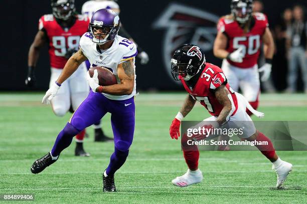 Michael Floyd of the Minnesota Vikings runs after a catch during the first half against the Atlanta Falcons at Mercedes-Benz Stadium on December 3,...