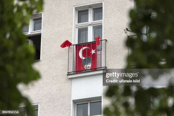 This Turkish flag with the portrait of Mustafa Kemal Atatuerk is been shown during the UEFA European Championship.