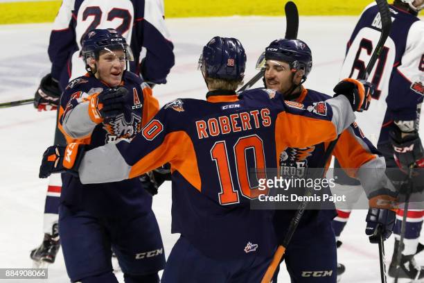 Forward Connor Roberts of the Flint Firebirds celebrates his first period goal against the Windsor Spitfires on December 3, 2017 at the WFCU Centre...