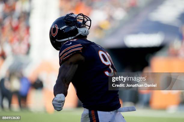 Lamarr Houston of the Chicago Bears celebrates after sacking quarterback Jimmy Garoppolo of the San Francisco 49ers in the second quarter at Soldier...