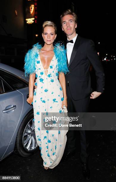 Poppy Delevingne and James Cook arrive in an Audi at the Evening Standard Theatre Awards at Theatre Royal on December 3, 2017 in London, England.