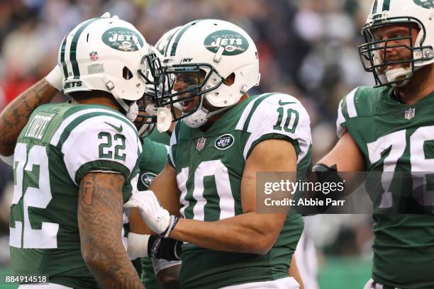 Jermaine Kearse of the New York Jets reacts after Matt Forte of the New York Jets scored a touchdown in the second quarter during their game at...