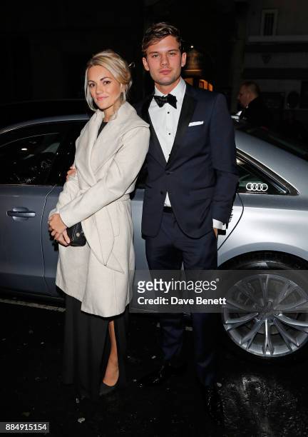 Guest and Jeremy Irvine arrive in an Audi at the Evening Standard Theatre Awards at Theatre Royal on December 3, 2017 in London, England.