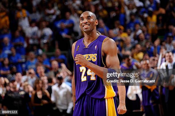 Kobe Bryant of the Los Angeles Lakers celebrates during the final minutes of the Lakers 99-86 win against the Orlando Magic in Game Five of the 2009...