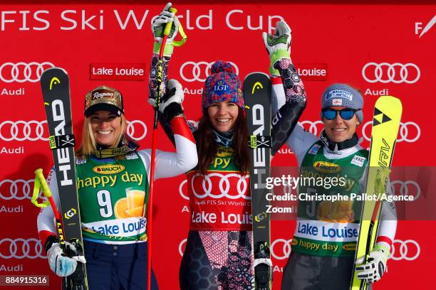 Tina Weirather of Liechtenstein takes 1st place, Lara Gut of Switzerland takes 2nd place, Nicole Schmidhofer of Austria takes 3rd place during the...