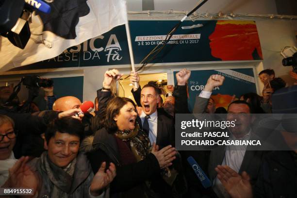 Candidate for the Pe a Corsica nationalist party for Corsican regional elections Gilles Simeoni celebrates with supporters in Bastia, on the French...