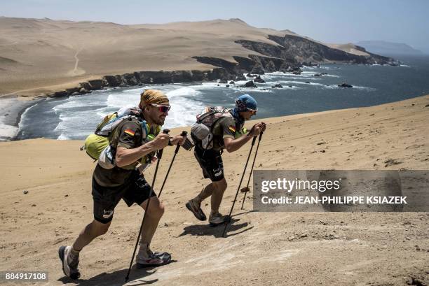 Competitors take part in the fifth stage 5 during the first edition of the Marathon des Sables Peru between Barloveto and Mendieta in the Ica desert...