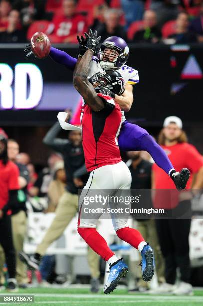 Andrew Sendejo of the Minnesota Vikings breaks up a pass intended for Julio Jones of the Atlanta Falcons during the second half at Mercedes-Benz...