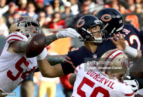 Cassius Marsh of the San Francisco 49ers reaches for quarterback Mitchell Trubisky of the Chicago Bears in the third quarter at Soldier Field on...