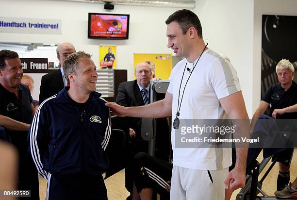 Vitali Klitschko and Oliver Pocher joke during the presentation of the competency team for Oliver Pochers casting show at the Mc Fit studio on June...