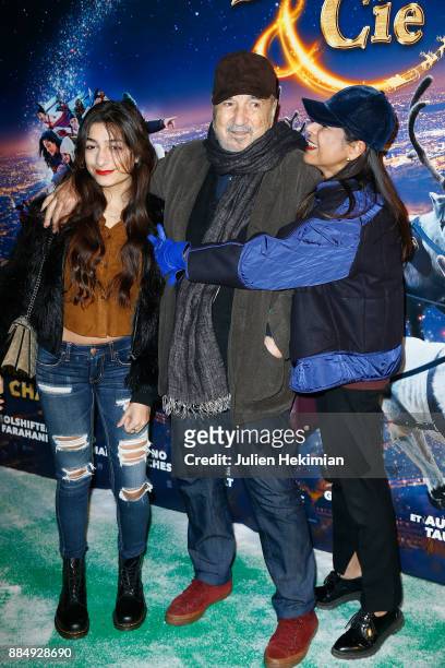 Kiara Carriere, her Father Jean-Claude Carriere and her Mother Nahal Tajadod attend "Santa & Cie" Paris Premiere at Cinema Pathe Beaugrenelle on...