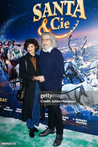 Director and actor of the movie Alain Chabat and actress Audrey Tautou attend "Santa & Cie" Paris Premiere at Cinema Pathe Beaugrenelle on December...