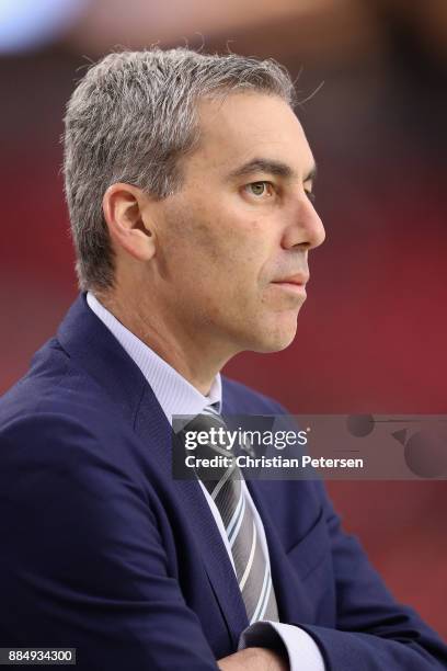 Los Angeles Rams president Kevin Demoff watches warm ups before the NFL game against the Arizona Cardinals at the University of Phoenix Stadium on...