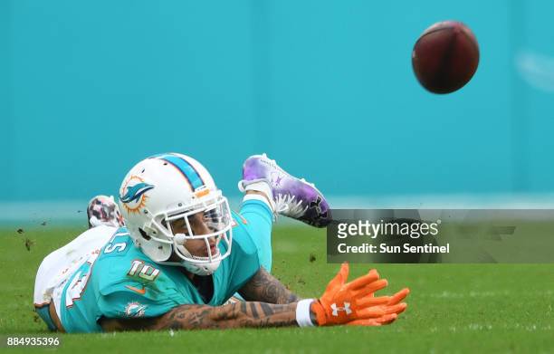 Miami Dolphins wide receiver Kenny Stills makes a circus catch in the second quarter against the Denver Broncos on Sunday, Dec. 3, 2017 at Hard Rock...
