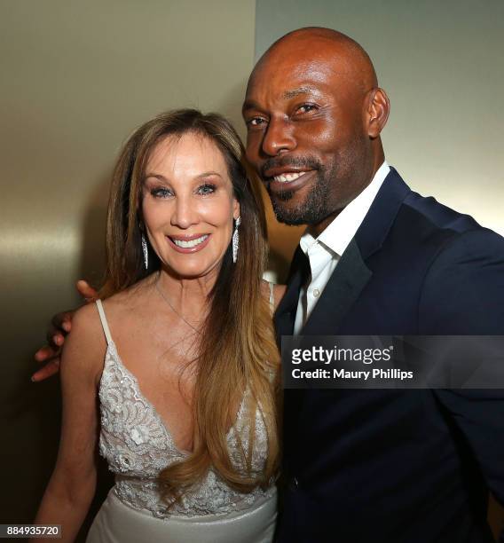 Cindy Cowan and Jimmy Jean-Lewis attend Affluent Attache red carpet launch benefiting Los Angeles Children's Hospital at OUE Skyspace LA on December...