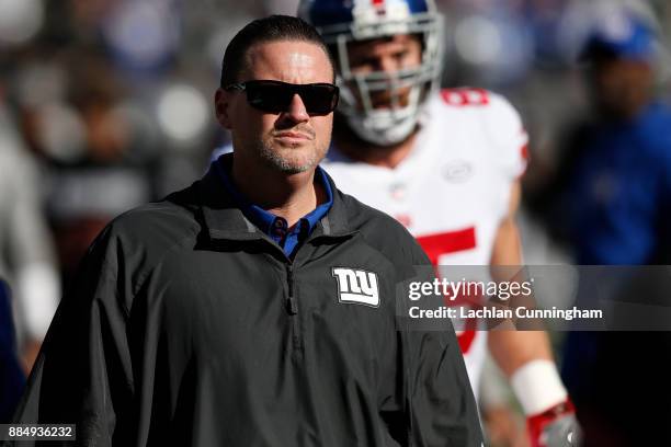 Head coach Ben McAdoo of the New York Giants looks on during warm ups prior to their NFL game against the Oakland Raiders at Oakland-Alameda County...