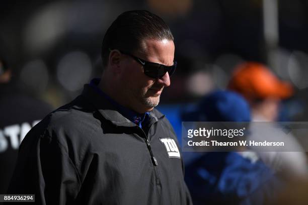 Head coach Ben McAdoo of the New York Giants looks on during warm ups prior to their NFL game against the Oakland Raiders at Oakland-Alameda County...