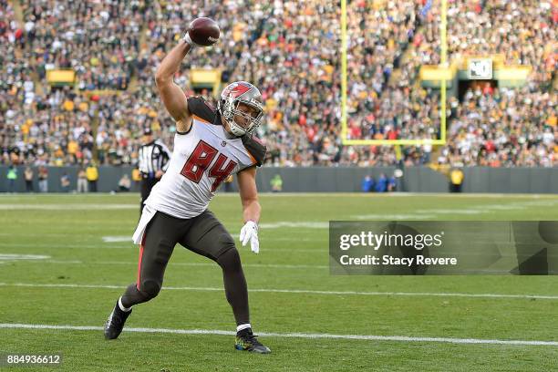 Cameron Brate of the Tampa Bay Buccaneers celebrates a touchdown against the Green Bay Packers during the second half at Lambeau Field on December 3,...