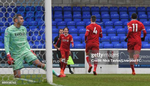 Lloyd Jones of Liverpool celebrates his goal with team mates Harry Wilson and Rhian Brewster during the Liverpool v Stoke City Premier League Cup...