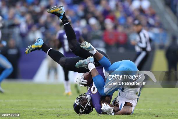 Tight End Benjamin Watson of the Baltimore Ravens is tackled in the third quarter against the Detroit Lions at M&T Bank Stadium on December 3, 2017...