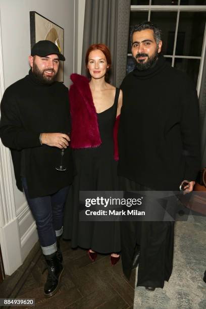 Michael Halpern, Taylor Tomasi Hill and Sultan Al Darmaki attend a welcome dinner hosted by Nadja Swarovski in anticipation of the Fashion Awards in...