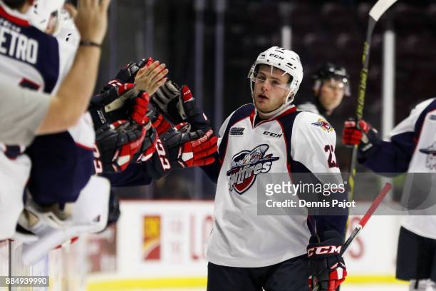 Forward Jake Smith of the Windsor Spitfires celebrates his game tying goal at 19:14 of the third period against the Flint Firebirds on December 3,...