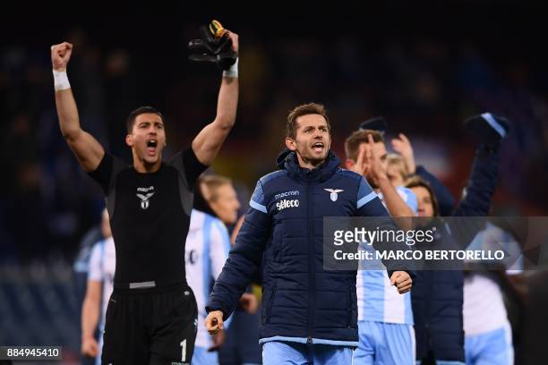 Lazio's goalkeeper from Albania Thomas Strakosha and Lazio's midfielder from Bosnia-Herzegovina Senad Lulic celebrate at the end of the Italian Serie...