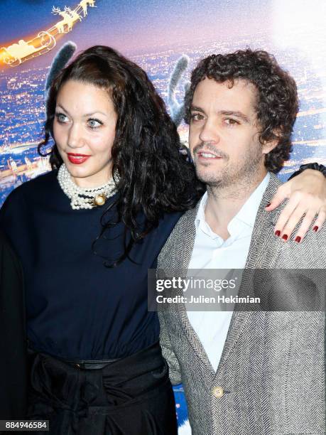 Louise Chabat and Bruno Sanches attend "Santa & Cie" Paris Premiere at Cinema Pathe Beaugrenelle on December 3, 2017 in Paris, France.