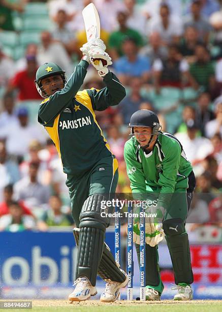 Abdul Razzaq of Pakistan hits out watched by Niall O'Brien of Ireland during the ICC World Twenty20 Super Eights match between Ireland and Pakistan...